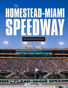 Homestead-Miami Speedway brochure cover showing a photo of the stands full of people and lights on with a blue sky above.