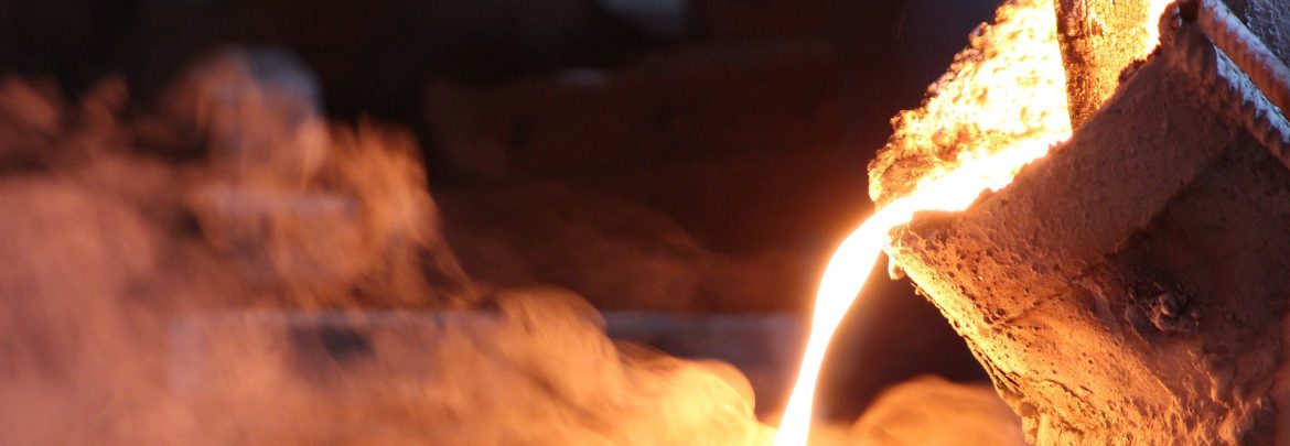 Investment Casting Institute. Glowing hot metal being poured.