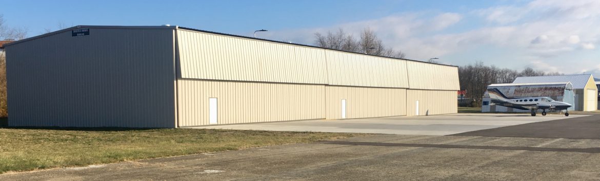 Joseph A. Hardy Connellville Airport hangar and plane.